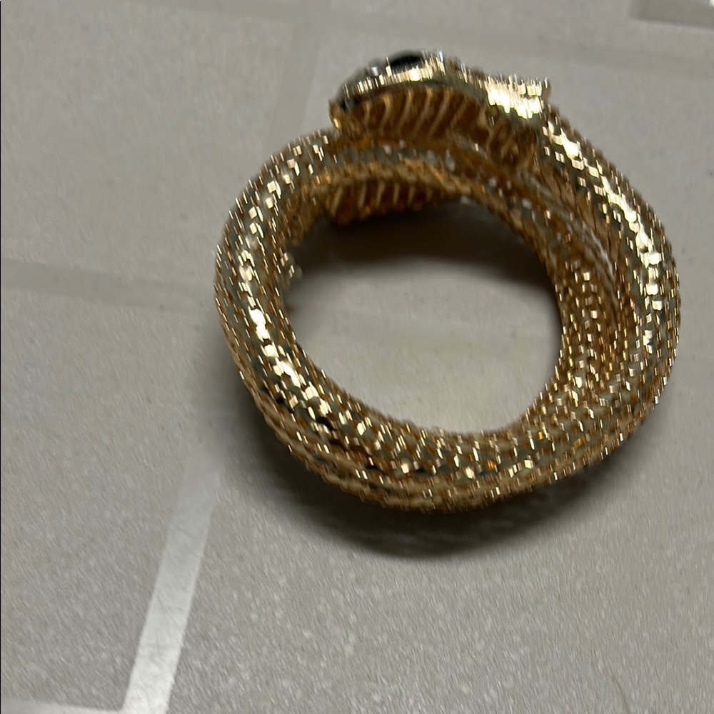 Gold tone and Silvery Serpent Bracelet with Sparkling Embellishments - Picture 2 of 12